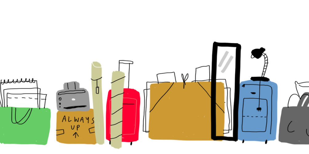 various suitcases, a lamp, a mirror, and boxes of different sizes